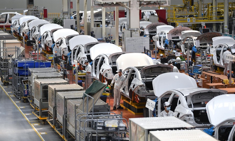 This photo taken on Feb 24, 2023 shows the assembly line of GAC Aion, an NEV subsidiary of Guangzhou Automobile Group Co., Ltd. (GAC Group), in Guangzhou, south China's Guangdong Province. Photo: Xinhua