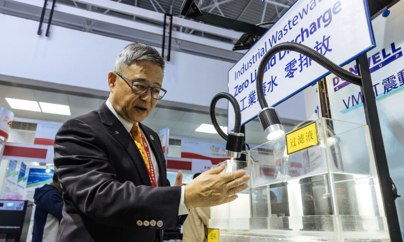 Professor Daniel Cheng Man-chung, president of the Hong Kong Environmental Industry Association, introduces his company’s water treatment technology at the China International Environmental Protection Exhibition and Conference in Beijing on April 10, 2024. Photo: Li Hao/GT