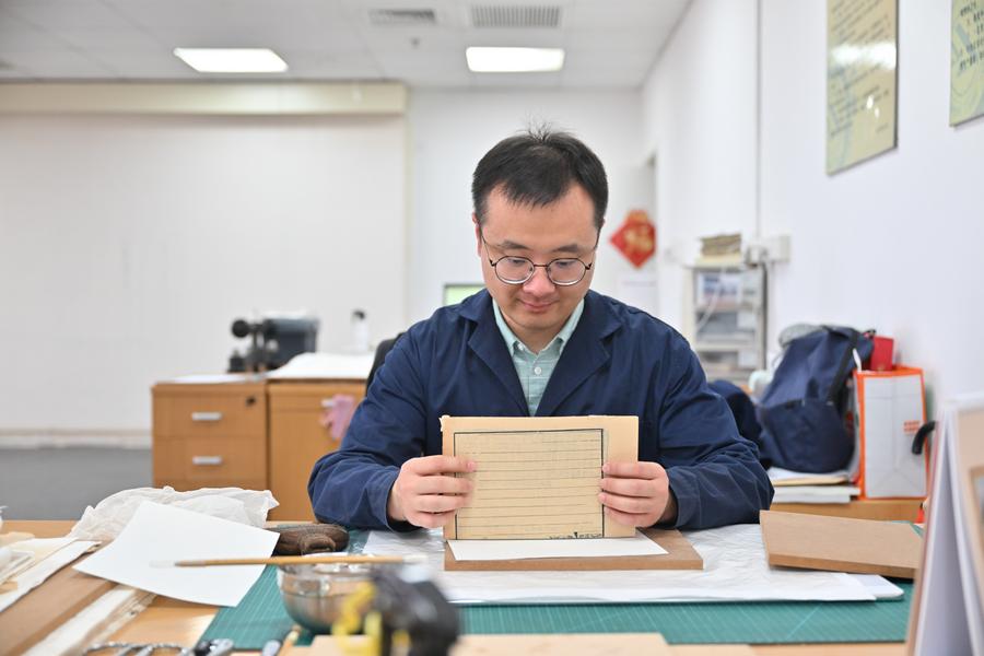 Chemical and biological methods help restore ancient books in north China