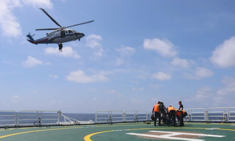 The CCG 3rd division deploys timely aid to rescue two injured crew members on March 16, 2023. Photo: Courtesy of CCG