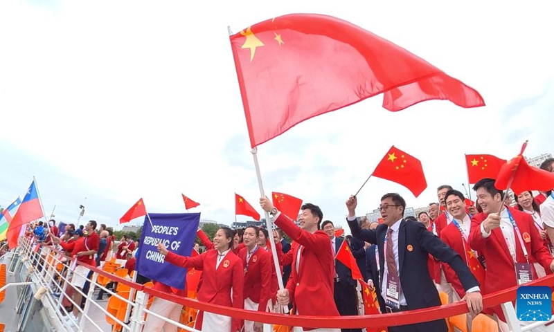 Members of the Chinese delegation attend the opening ceremony of the Paris 2024 Olympic Games in Paris, France, July 26, 2024. (Photo: Xinhua)