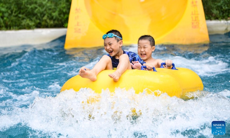 Children have fun at a water park in Fuling District, southwest China's Chongqing Municipality, Aug. 18, 2024. Photo: Xinhua