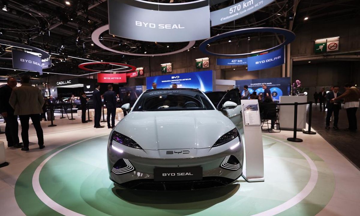 People visit the pavilion of Chinese carmaker BYD at the 2024 Paris Motor Show during the media day in Paris, France, Oct. 14, 2024. (Photo: Xinhua)