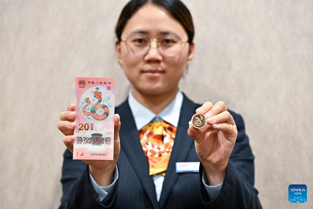 Commemorative coins, banknotes to celebrate upcoming Chinese New Year start to exchange