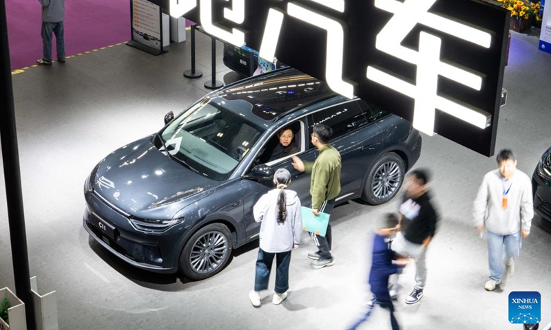 People visit the 20th China (Changsha) International Automobile Exposition in Changsha, central China's Hunan Province, Dec. 4, 2024. The 6-day exposition, with an exhibition area of 120,000 square meters, kicked off on Wednesday at the Changsha International Convention and Exhibition Center, showcasing more than 1,000 vehicles from over 80 automobile brands. Photo: Xinhua