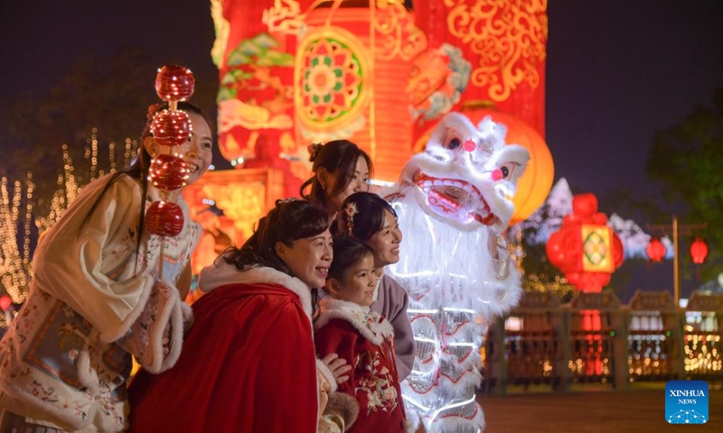 Tourists visit the 31st Zigong International Dinosaur Lantern Show in Zigong, southwest China's Sichuan Province, Jan. 17, 2025. The national-level intangible cultural heritage project Zigong lantern show boasts a long history, as it can be traced back to the Tang (618-907) and Song (960-1279) dynasties. In 1964, Zigong held the first lantern show celebrating the Spring Festival. So far, making colorful lanterns has become a popular industry here, with Zigong lanterns having been displayed in more than 80 countries and regions. Making a Zigong lantern involves many craftsmen, including art designers, bench workers, mechanics, electricians and paperhanging workers. The complete process can hardly be found in other places in China. Photo: Xinhua